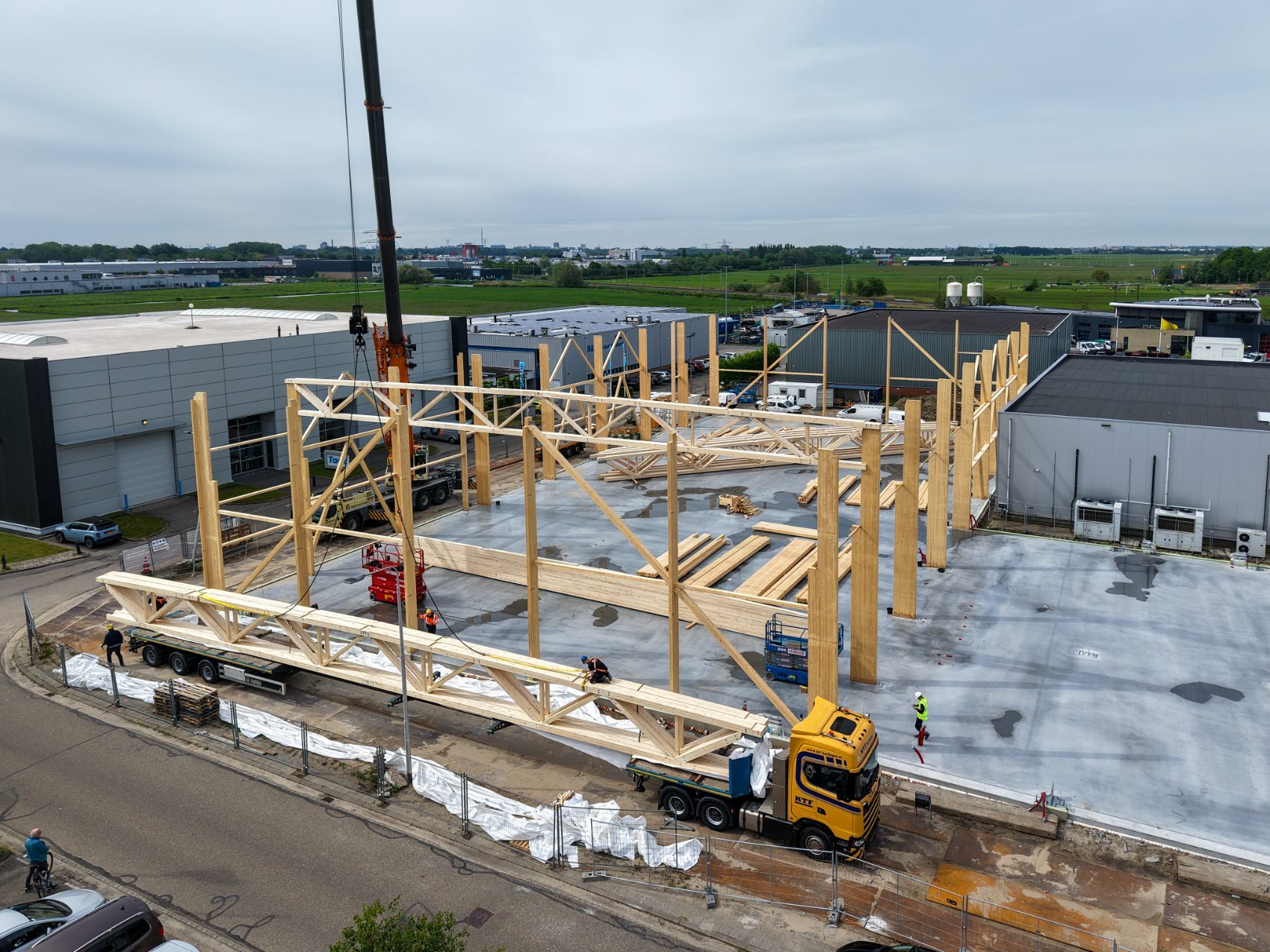 Aerial view of a glulam frame under erection